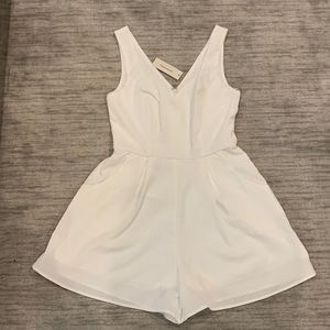White small Brand new farncessca’s romper.